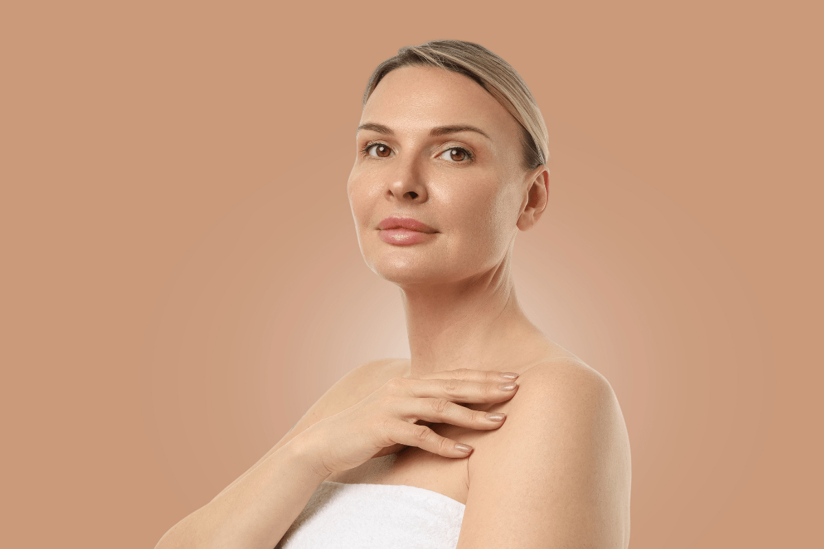 Woman with smooth, youthful skin showcasing tips on how to keep your skin glowing longer after a facial treatment.