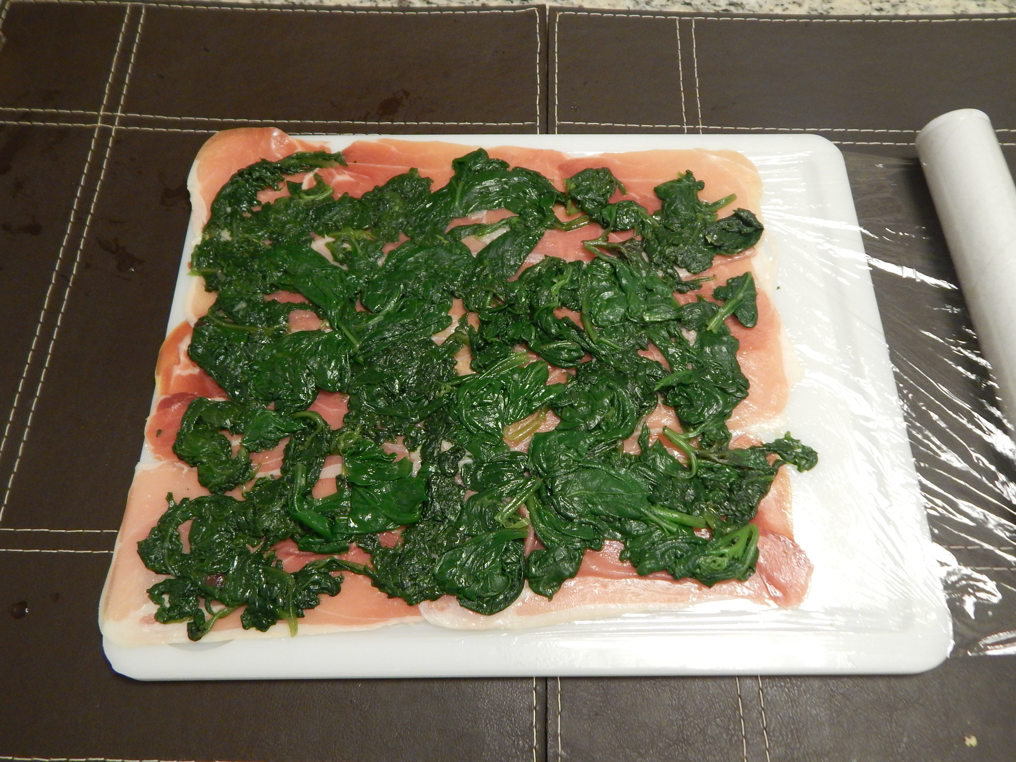 com o espinafre por cima