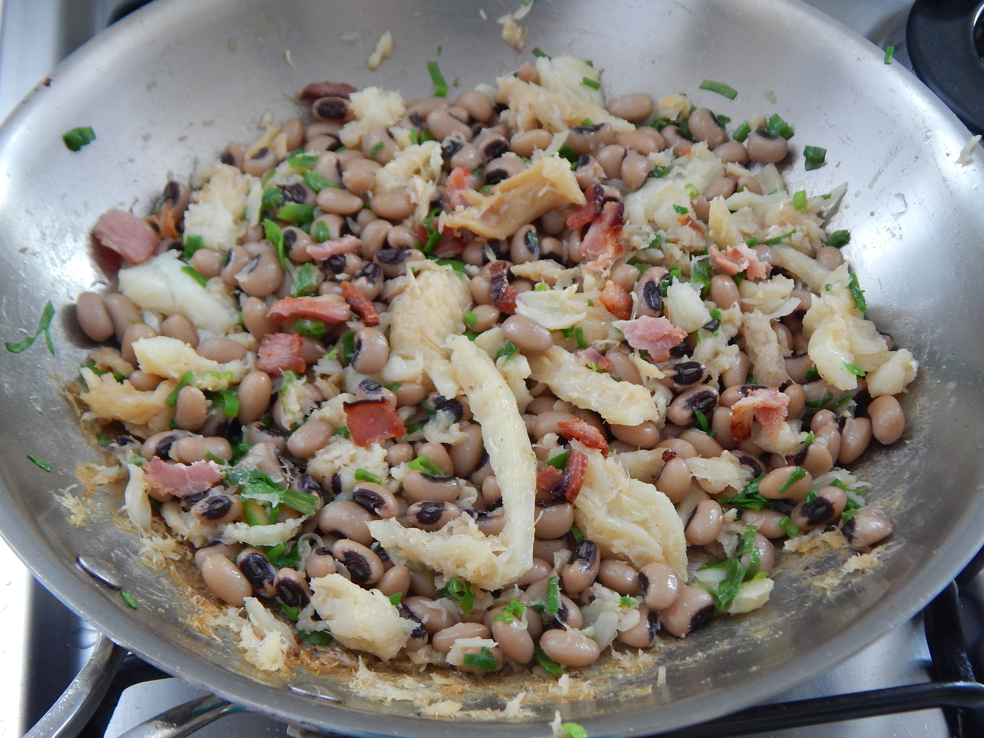 Misture o feijão, junte a cebolinha