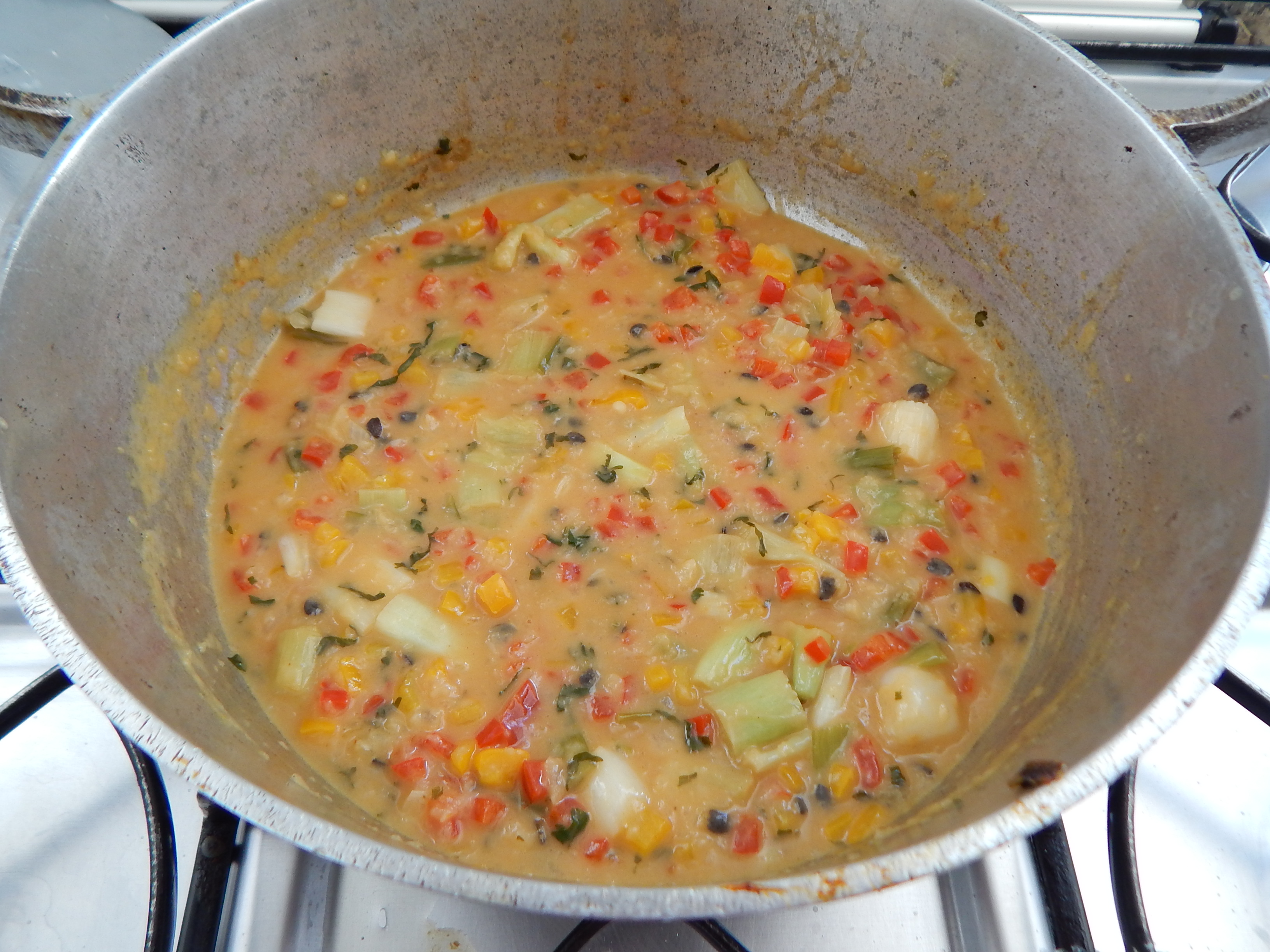 Junte o leite de coco e tempere