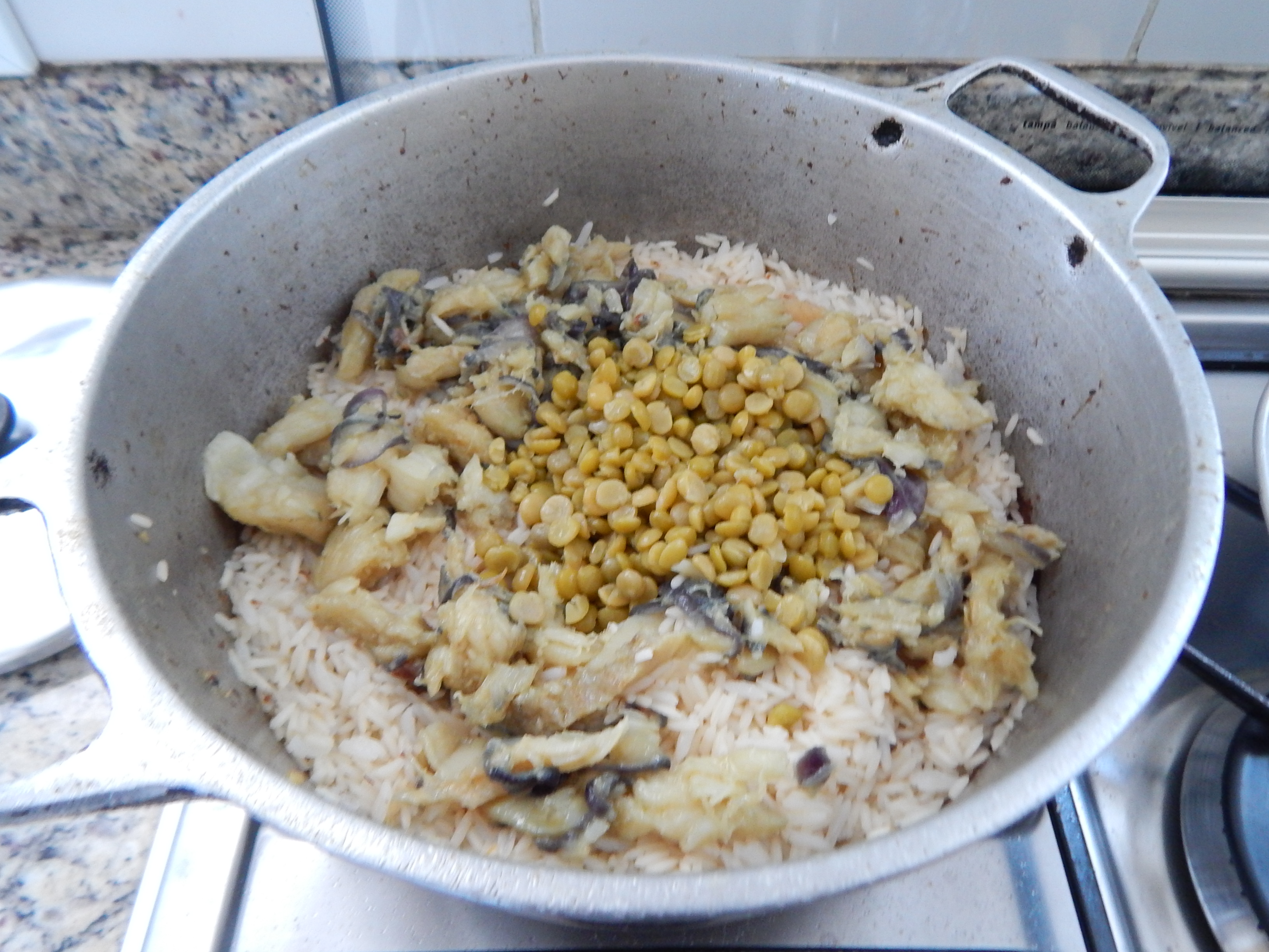 Acrescente a lentilha e o arroz