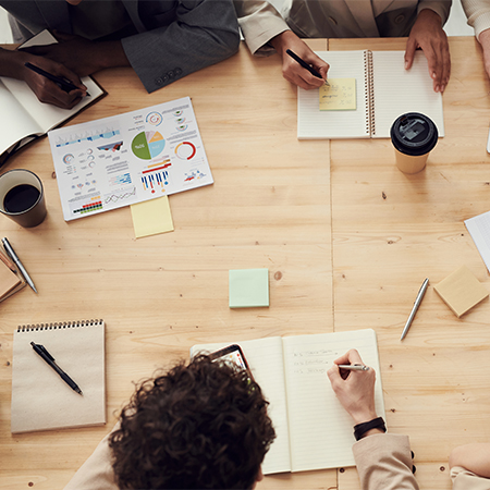 Collaborative board meeting at table