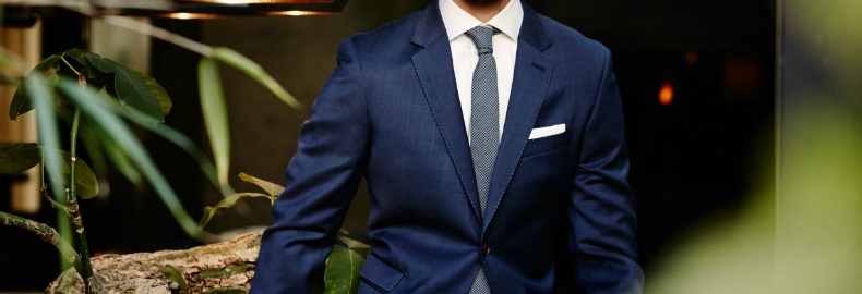 Can i wear a black suit to a wedding?