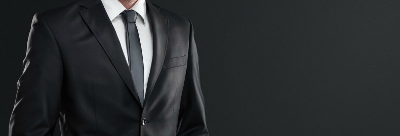 Can i wear a black suit to a wedding?
