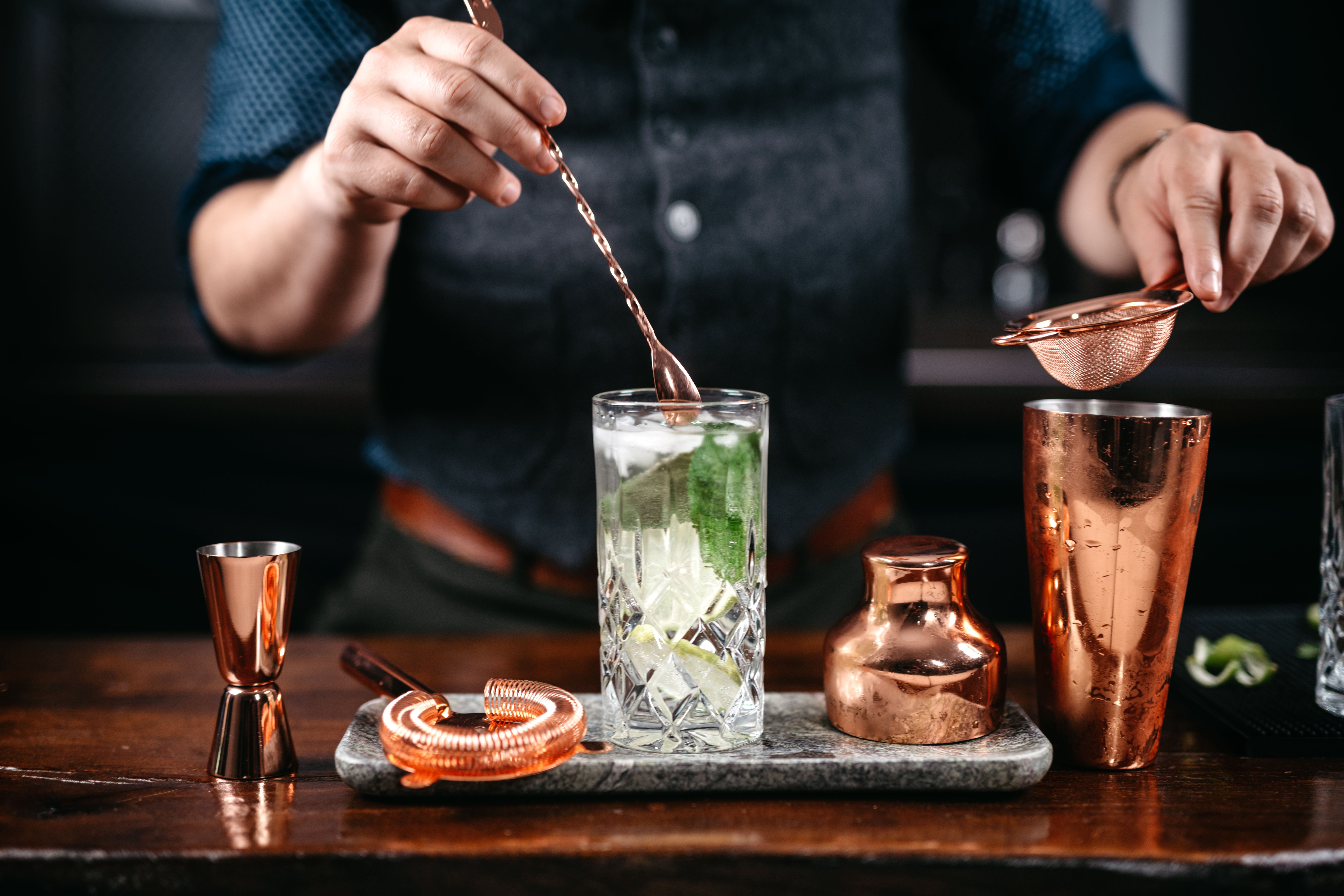 Bartender preparing a cocktail for service