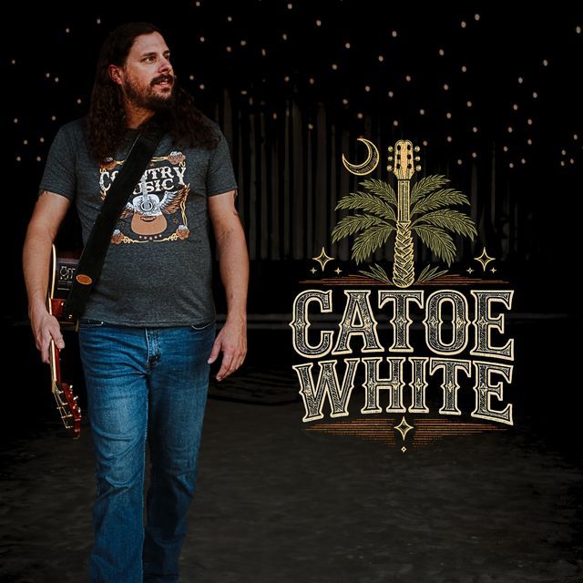 Male guitarist with long hair and beard, carrying an electric guitar over his shoulder, wearing a gray 'Country Music' shirt and jeans, walking on a dark stage beside a decorative logo featuring a palm tree, a guitar motif, stars, and the text 'CATOE WHITE'