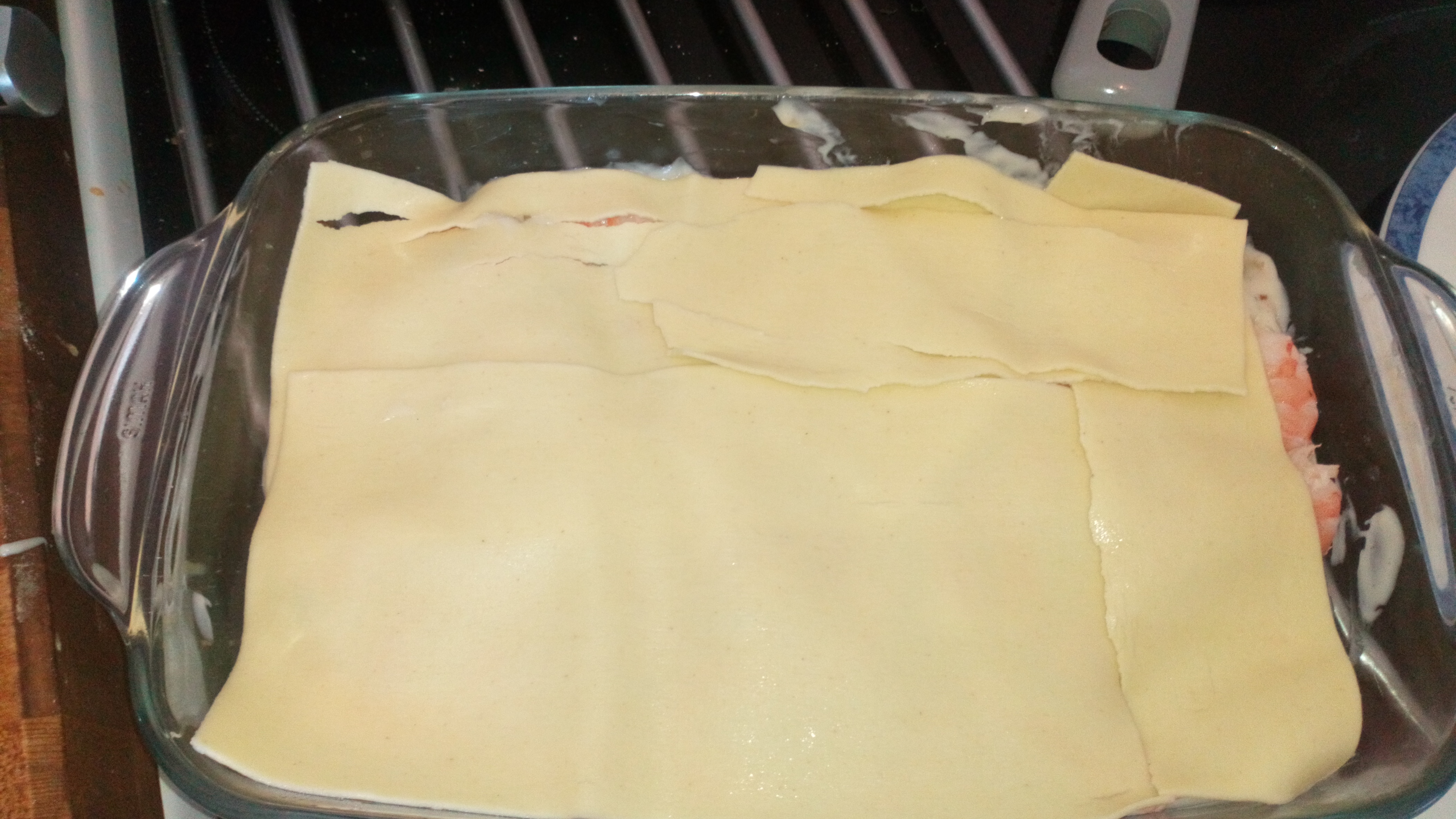 Recourvrir à nouveau de pâtes.Cover with pasta.