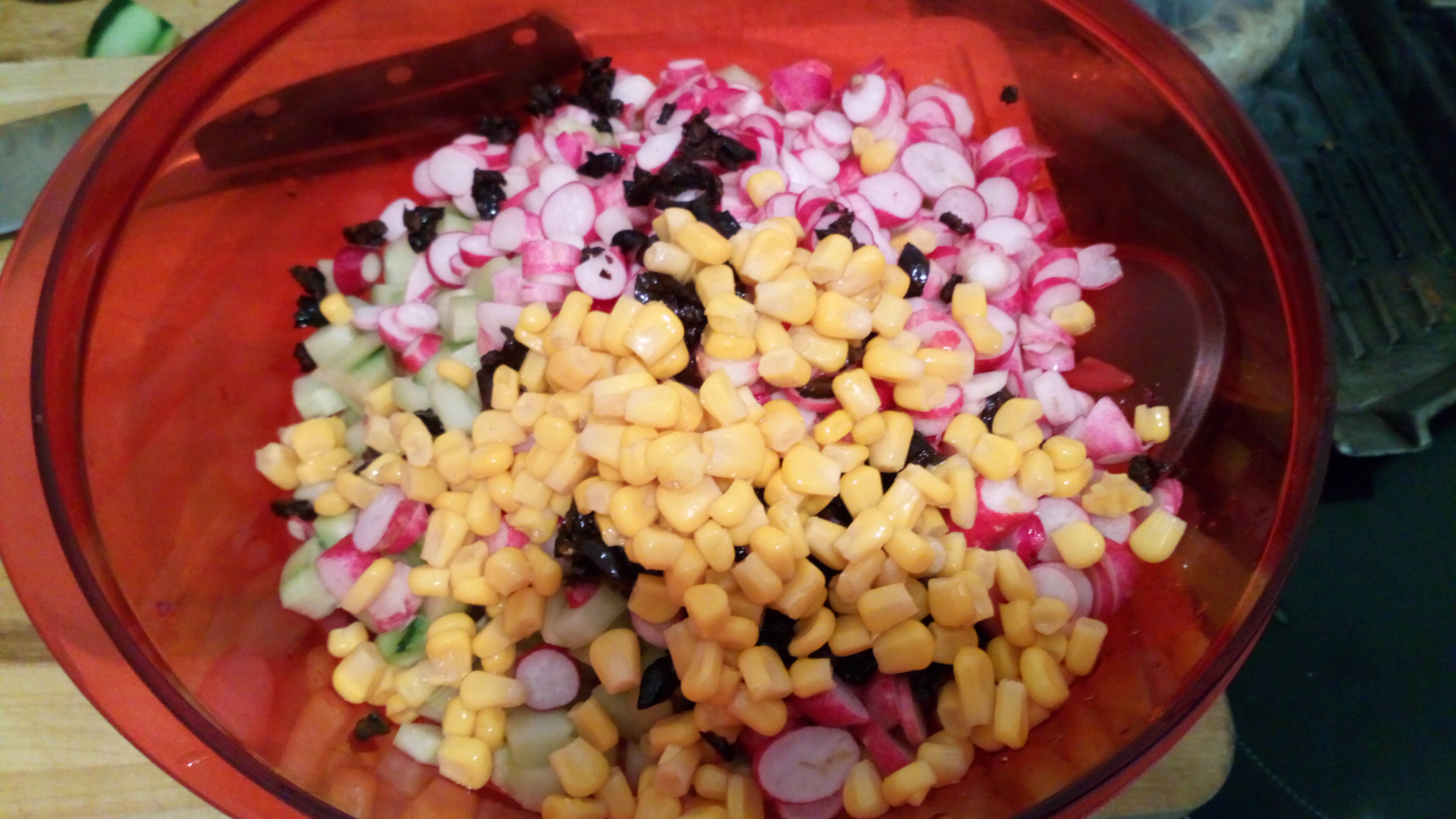 Ajouter le maïs en boîte. Add tin corn.