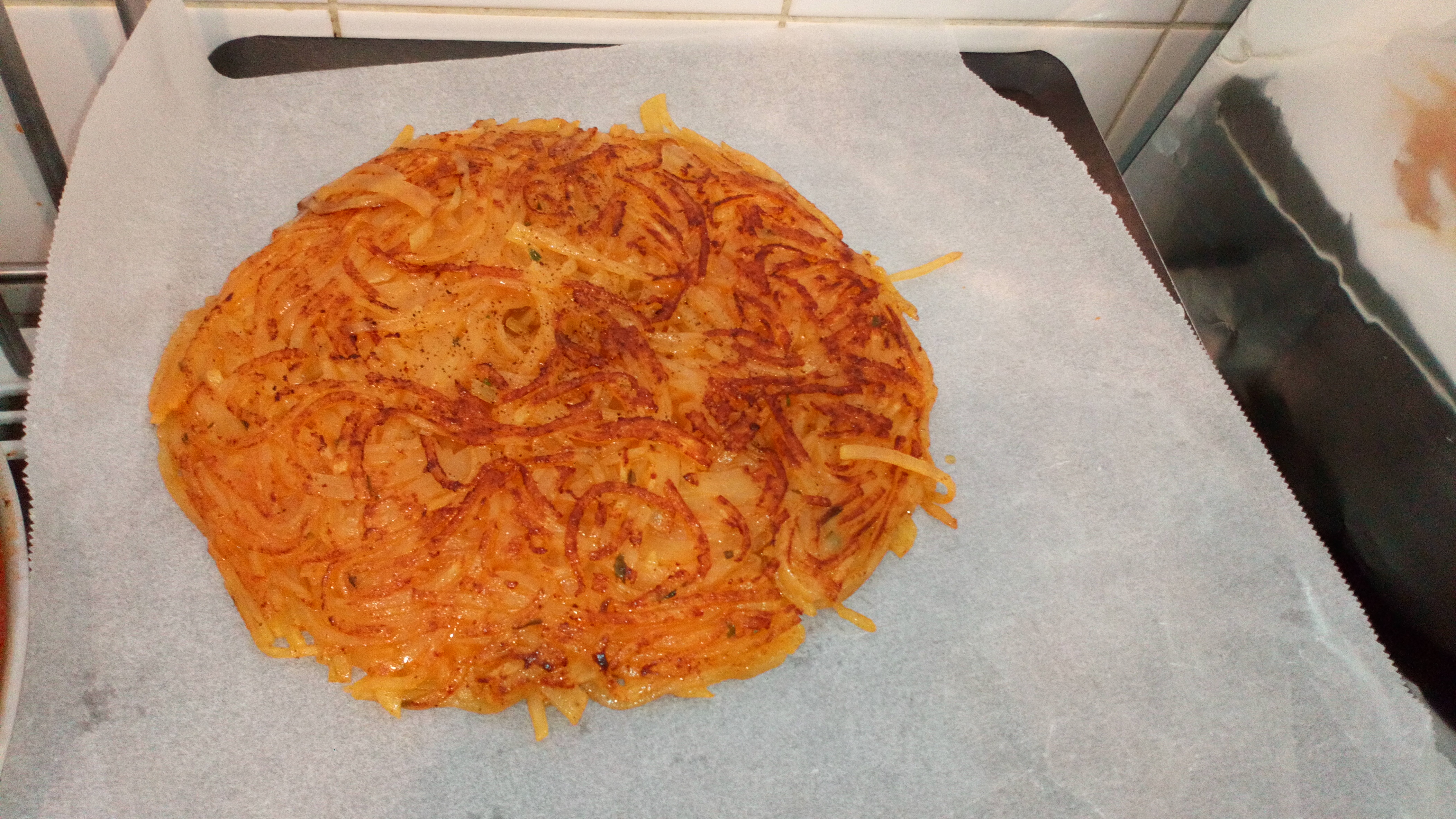 La faire glisser sur une plaque munie d'une feuille de cuisson. Make it slide on a plate provided with a sheet of cooking