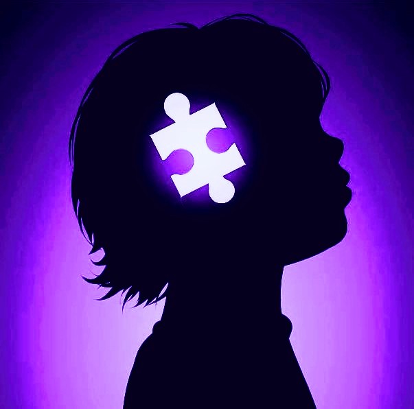 Young girls profile with missing piece of puzzl