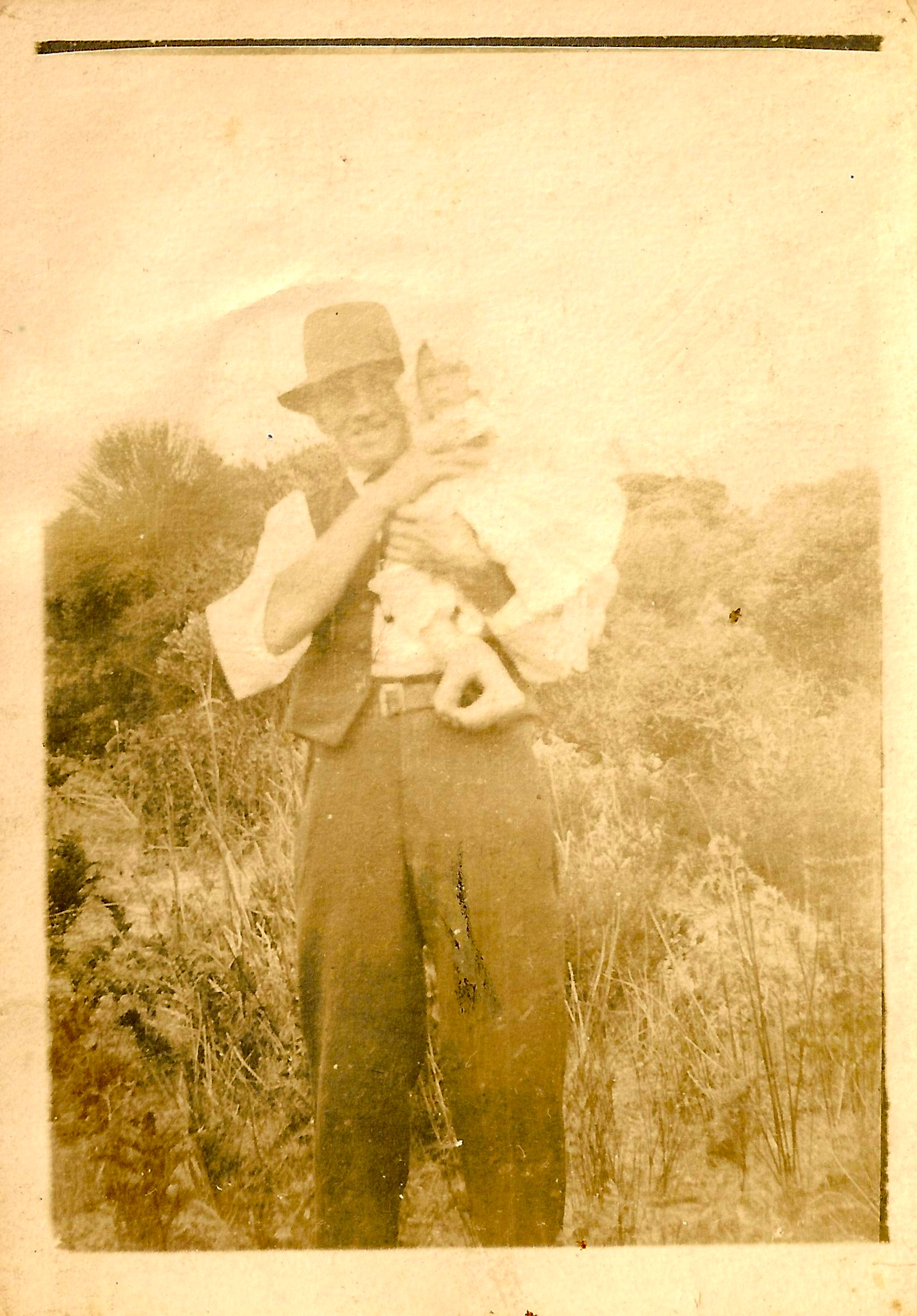 Walter with Dorothy (same child in the next photo). This is a precious family photo of Dorothy, she was born in 1921 when Walter would have been 35.
