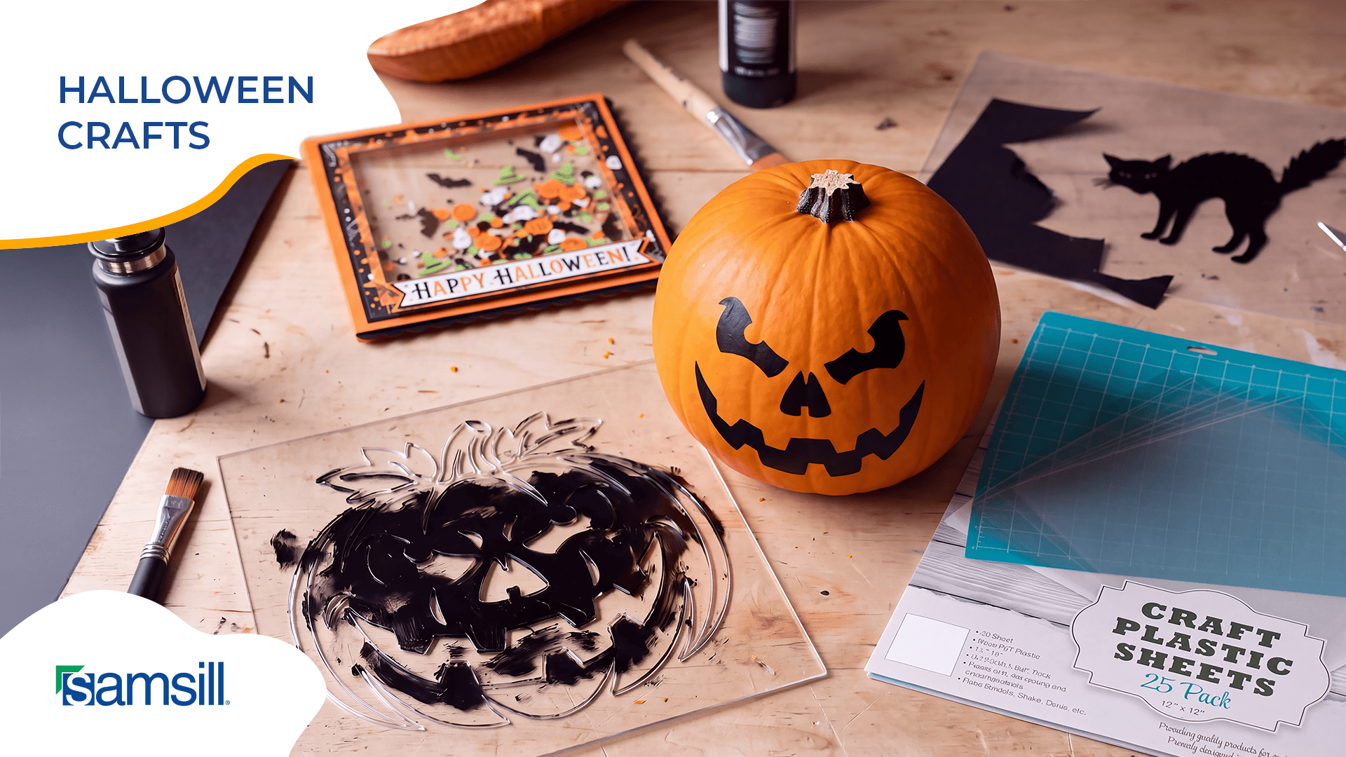 Craft Table with a Carved Pumpkin and Halloween Crafts Like Paints Cutters and a Cutting Mat shelves Visible