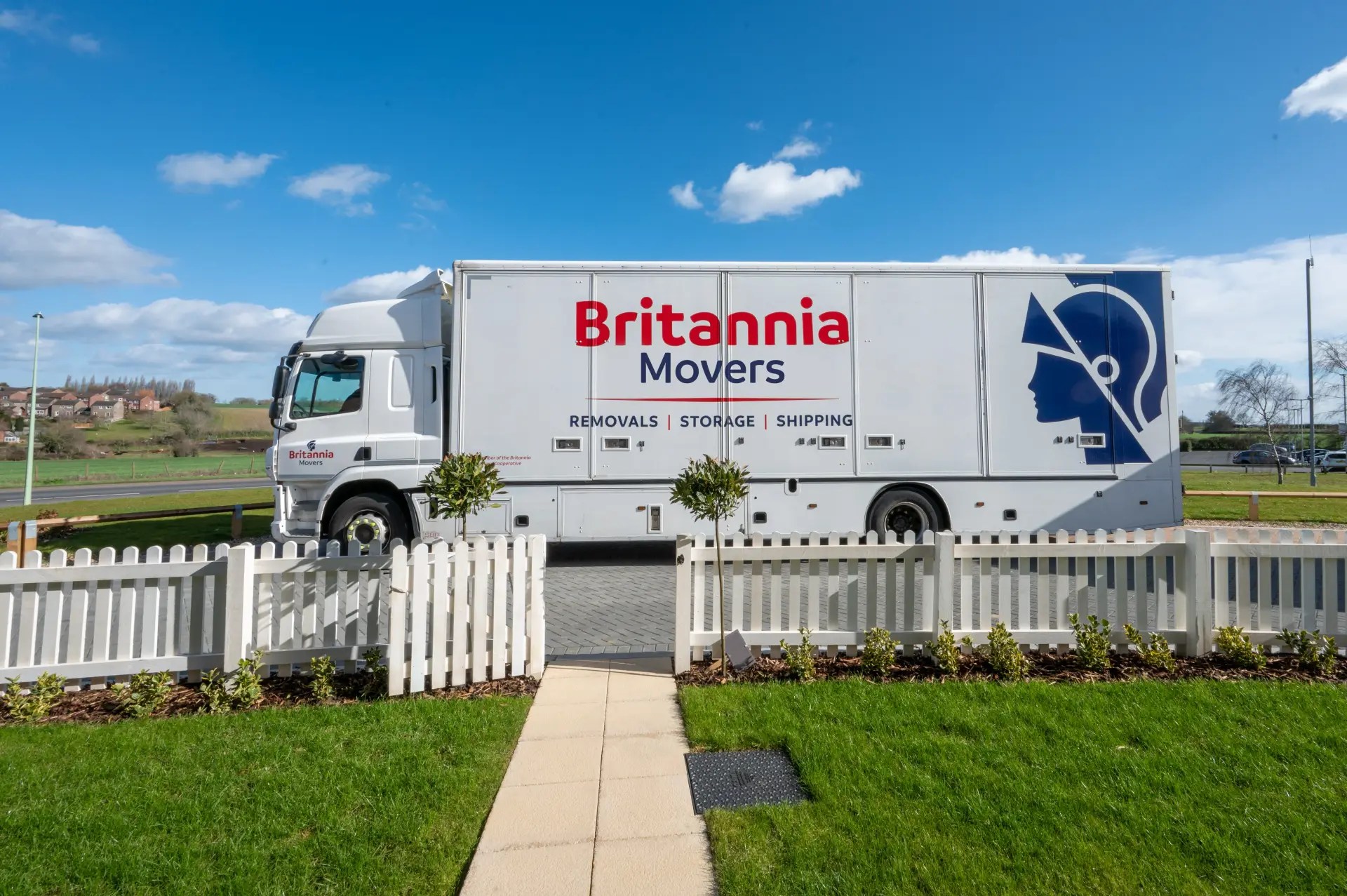 Surrey moving house checklist — a Britannia Sandersteads lorry outside a Surrey home