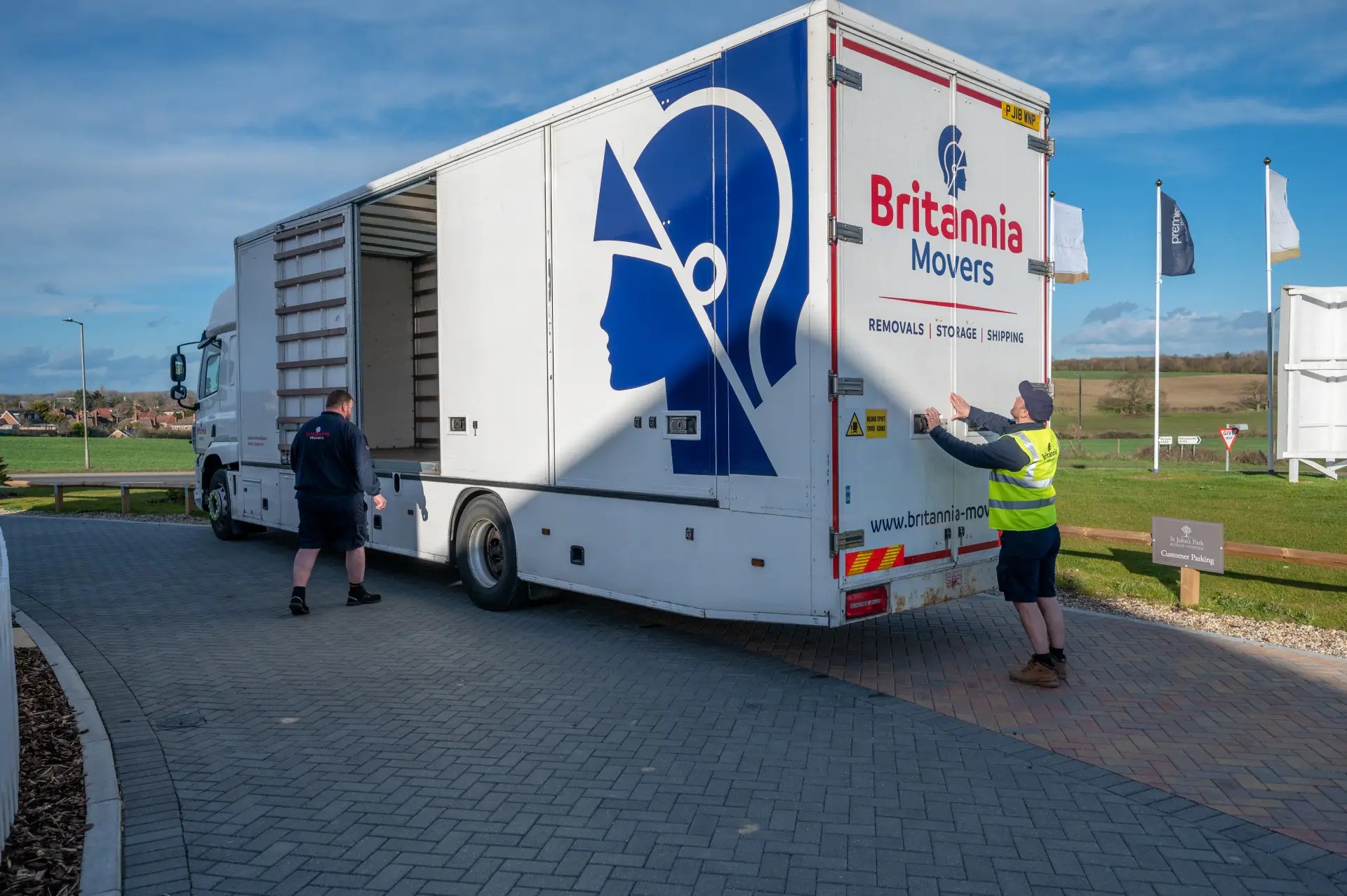 Removals to France from the UK — a Britannia Sandersteads lorry and crew ready to load