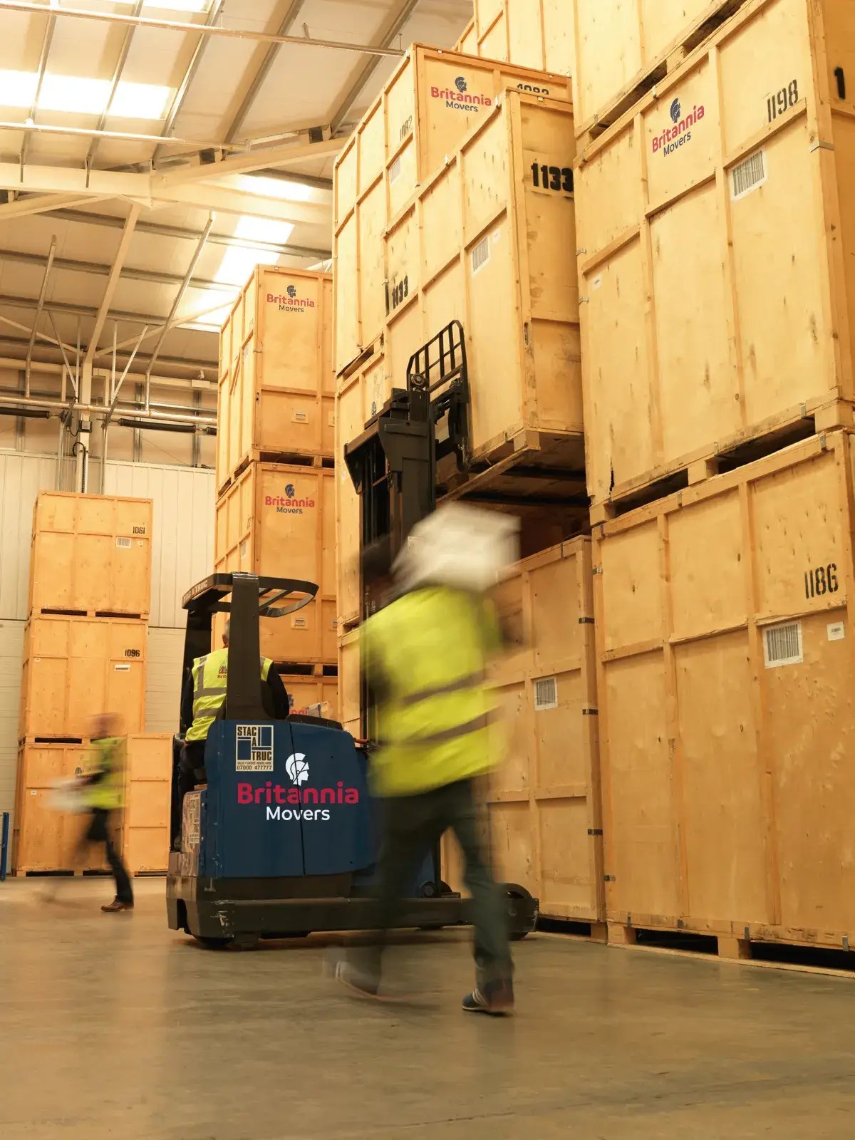 Britannia Sandersteads warehouse crew with forklift at Surrey depot