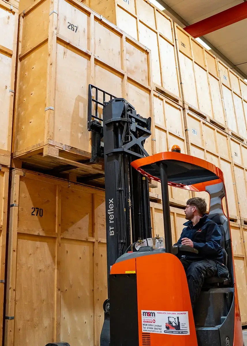 Britannia Sandersteads crew and forklift preparing an international move at our Godstone depot in Surrey