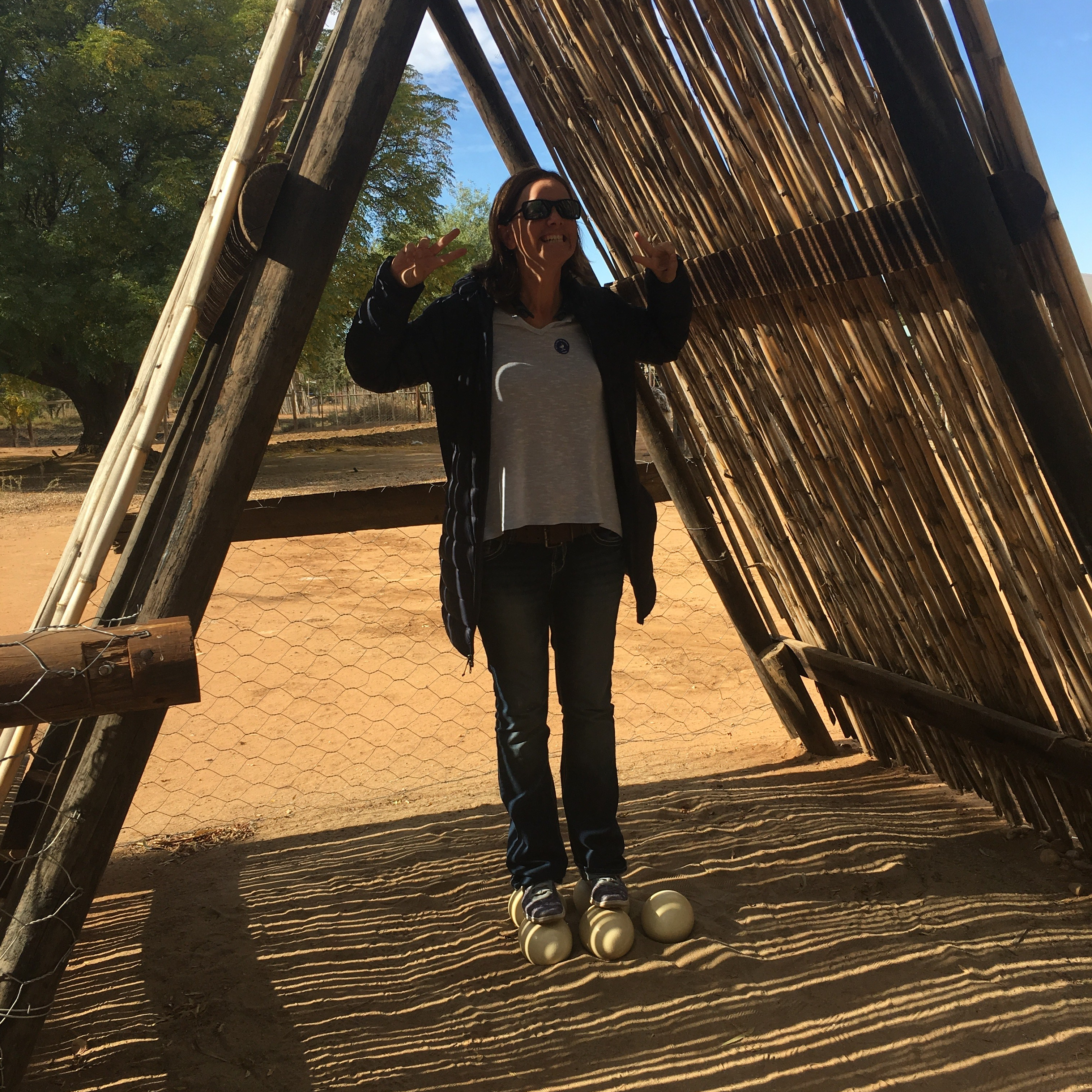 Woman Standing on Ostrich Eggs