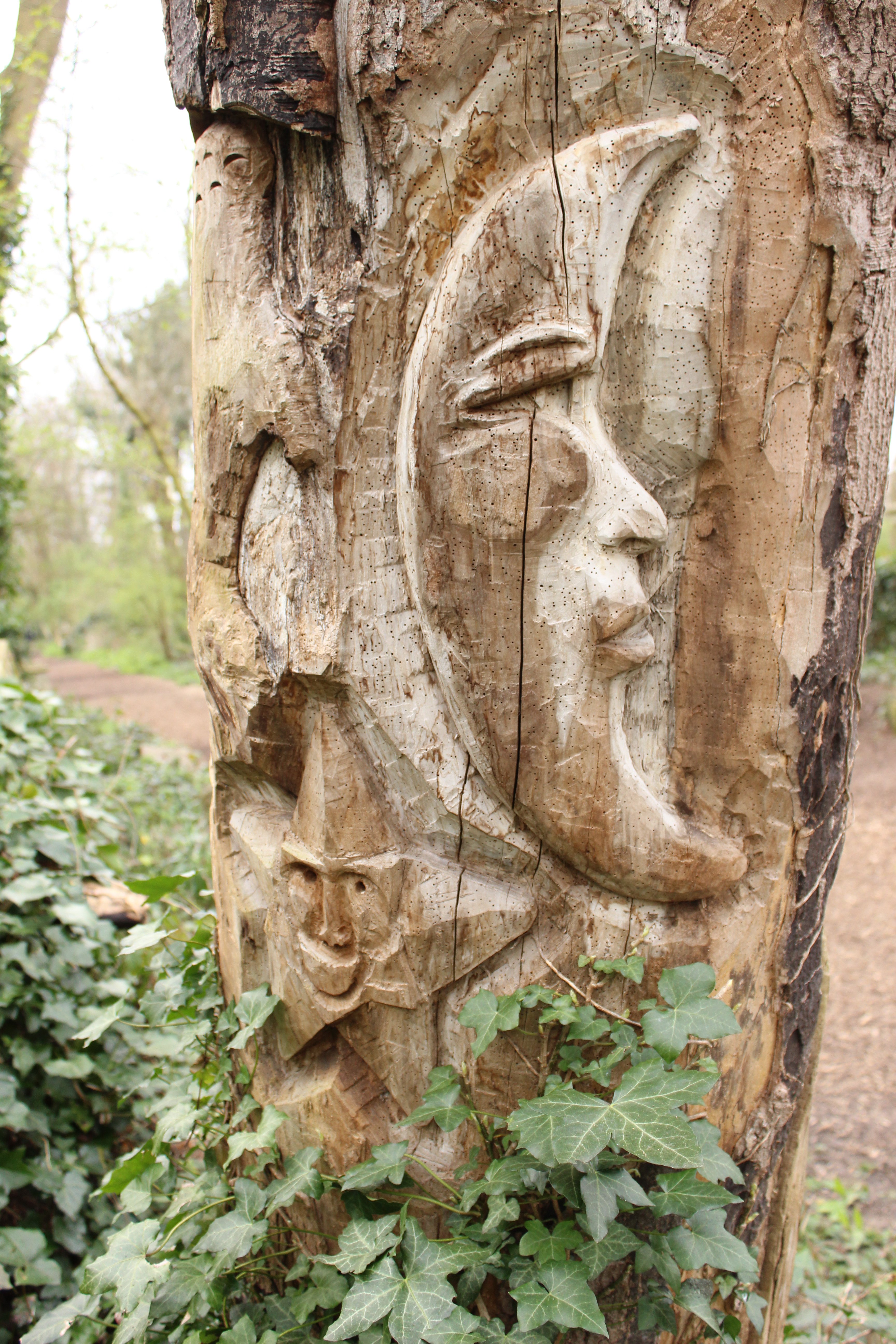 Tree carvings from the green woodworkers at Abney Cemetry