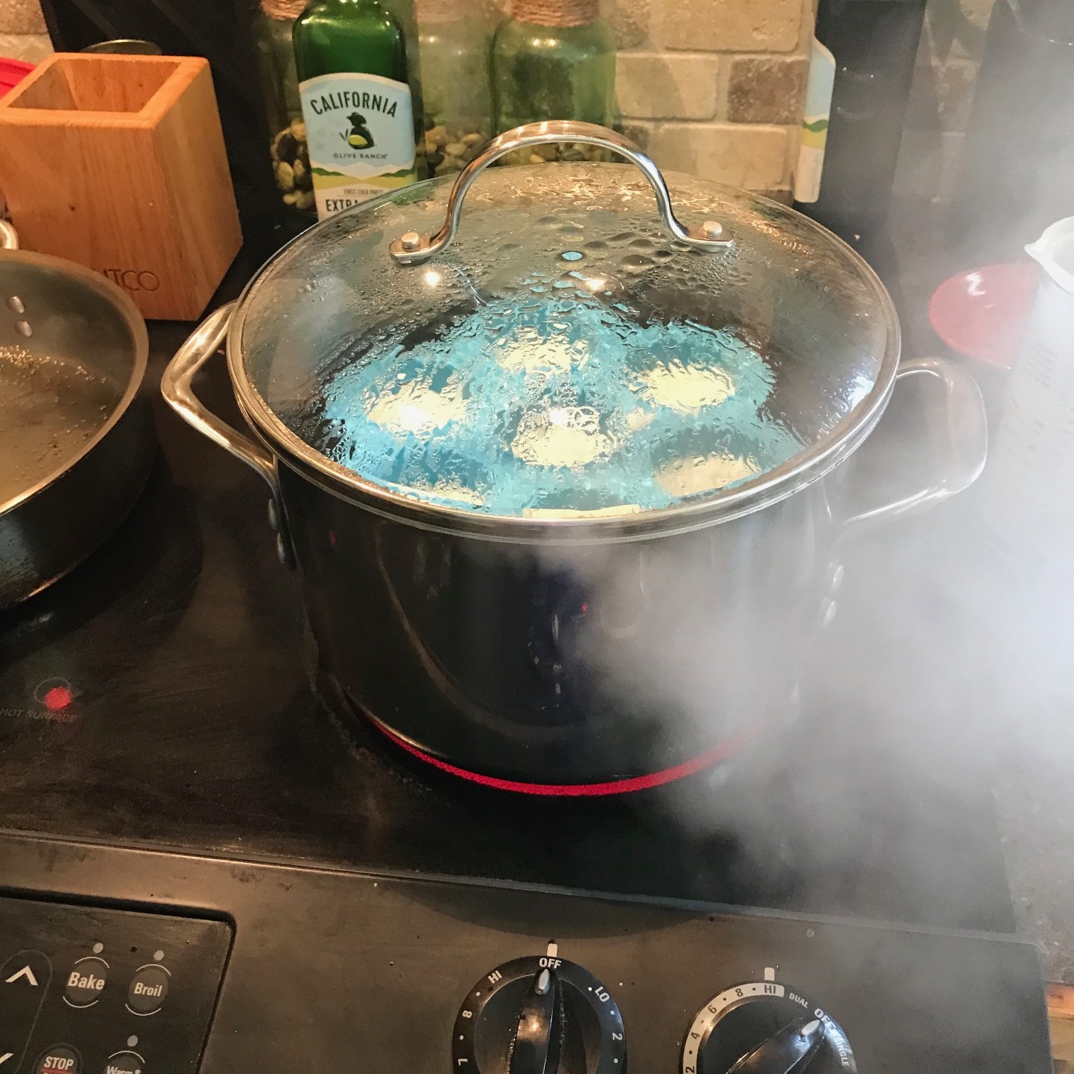 4. Let 'em steam. Once they start to steam, turn down heat to medium.