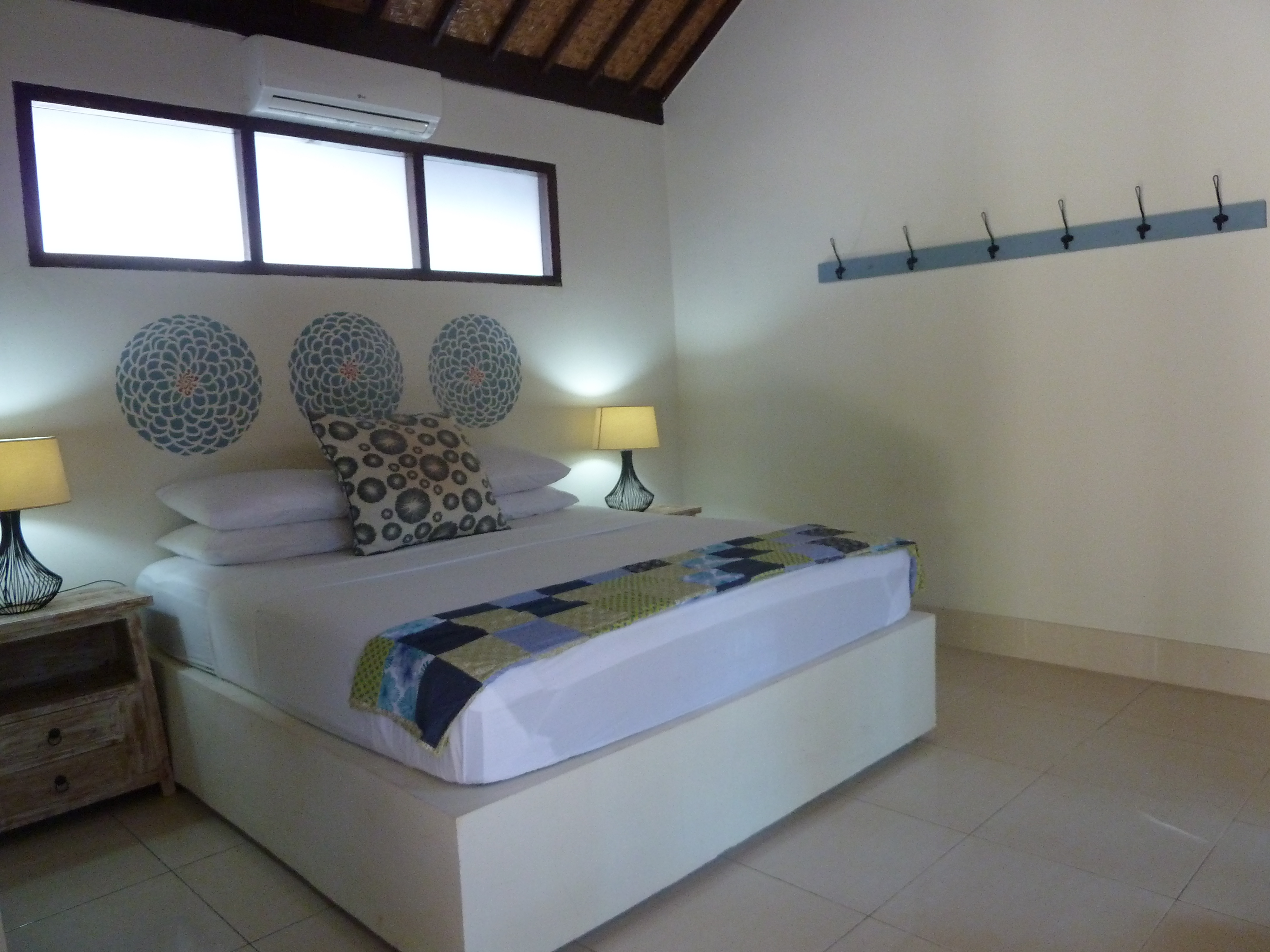 All our rooms are slightly different but have traveler essentials like plenty of power points, good reading lamps & hooks