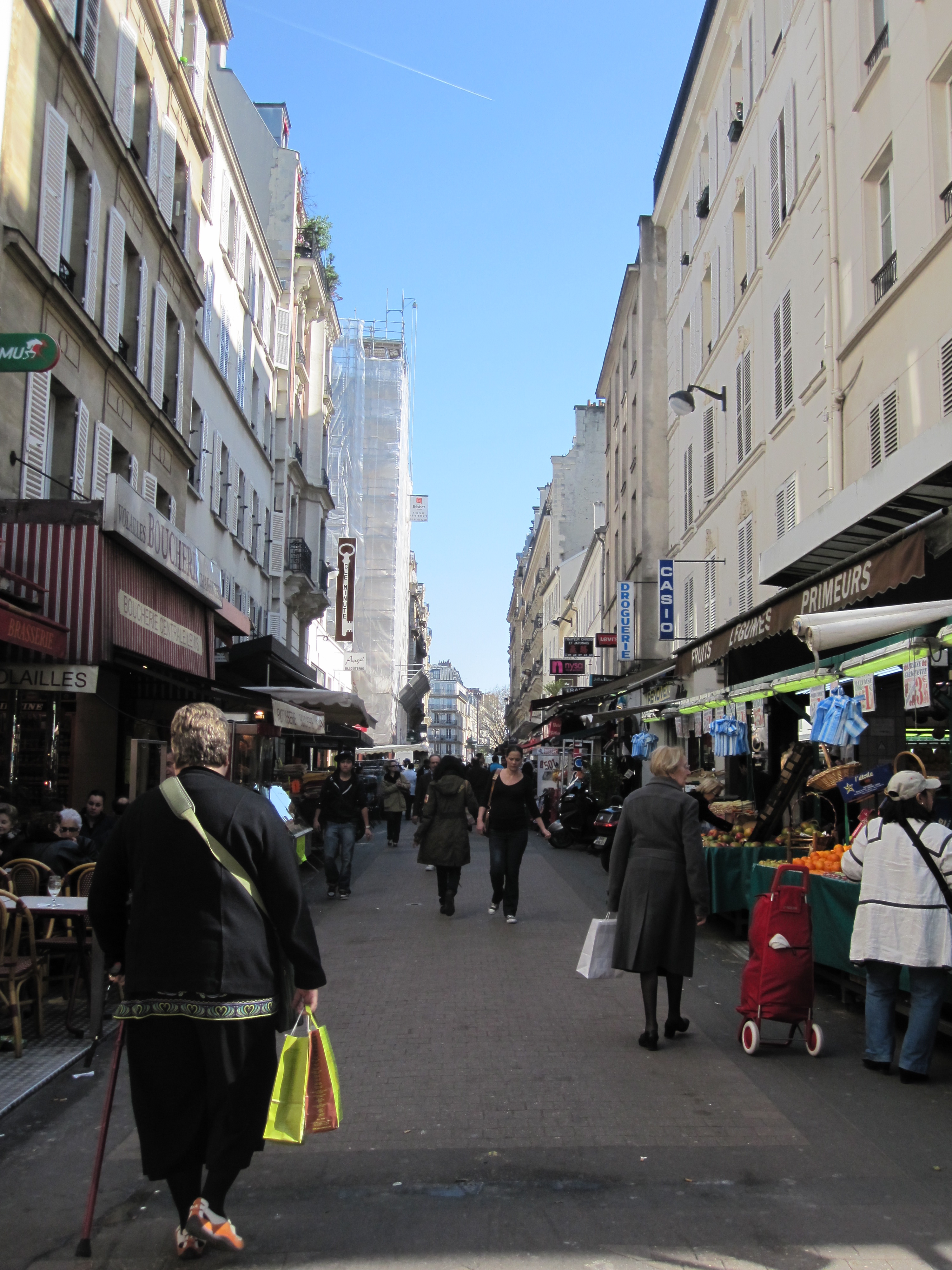 It'd be fun to shop on a street like Rue de Levis everyday photo - Karen Anderson