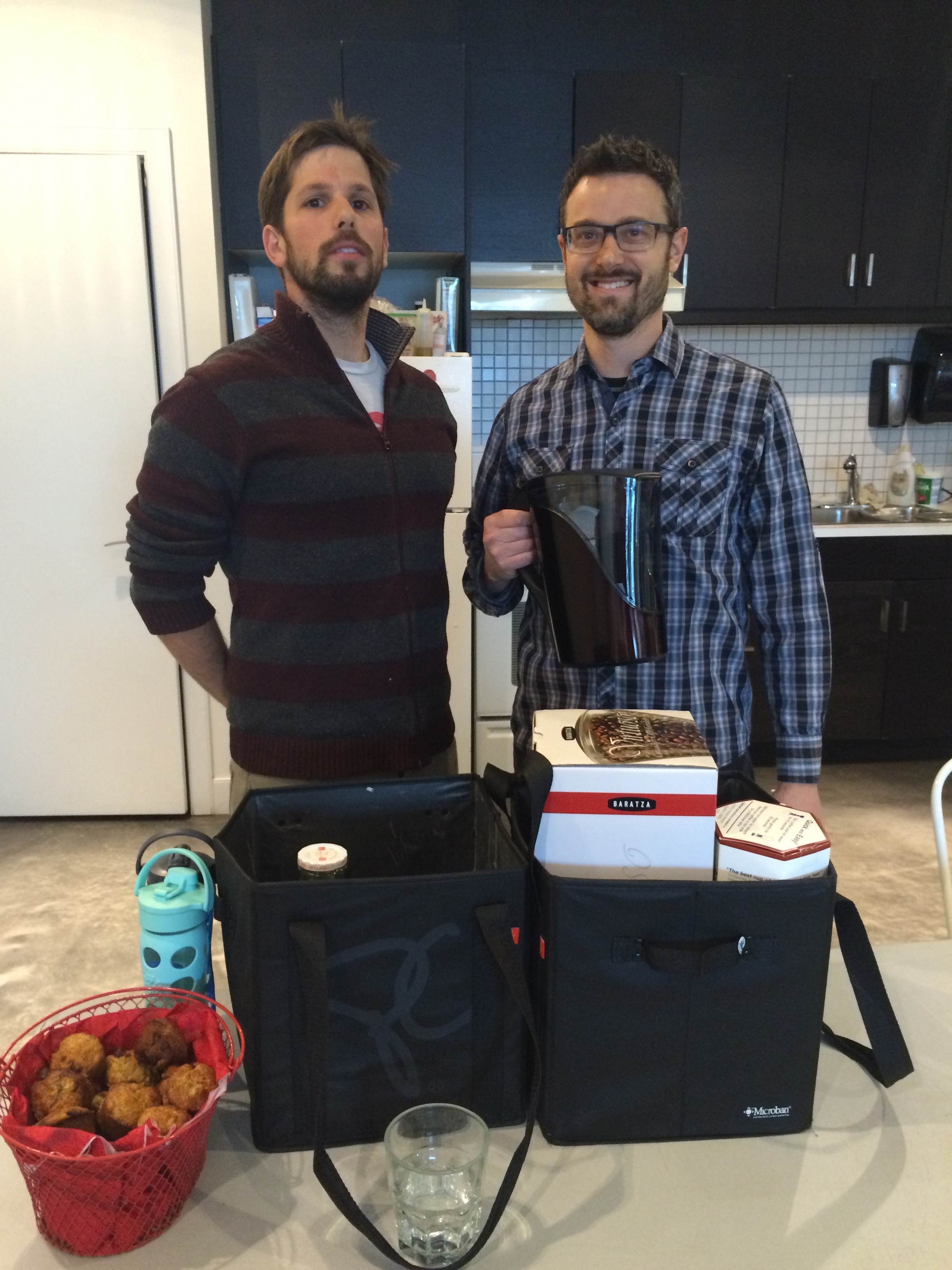 Seb's not too sure about all my coffee crapola but Phil's gotten into it! - photo - Karen Anderson