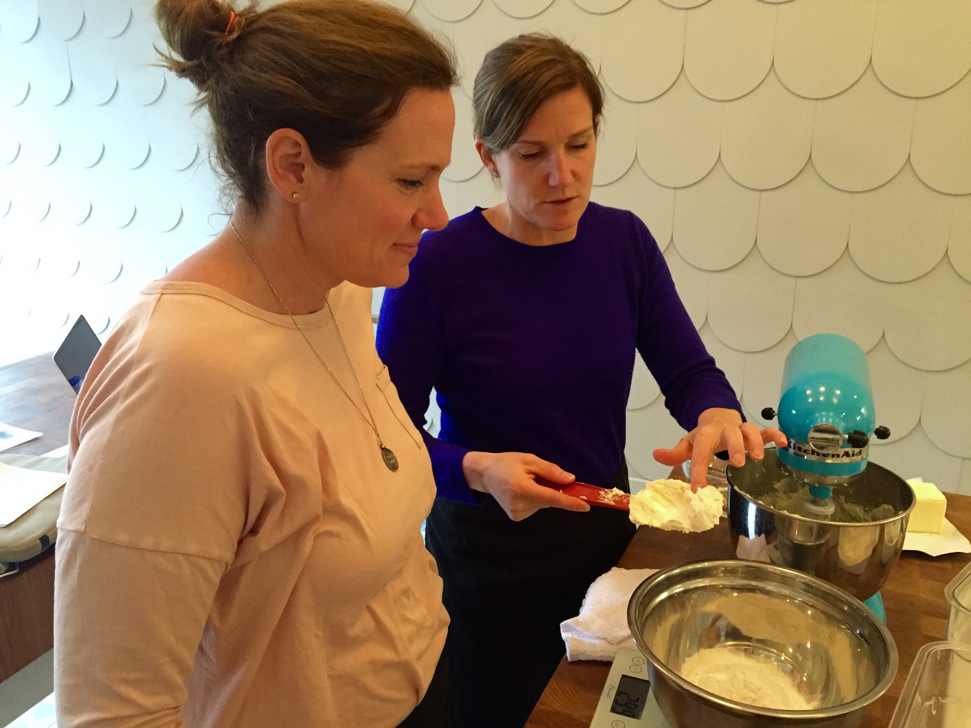 Jodi and Carolyne check the cookie dough - photo - Karen Anderson
