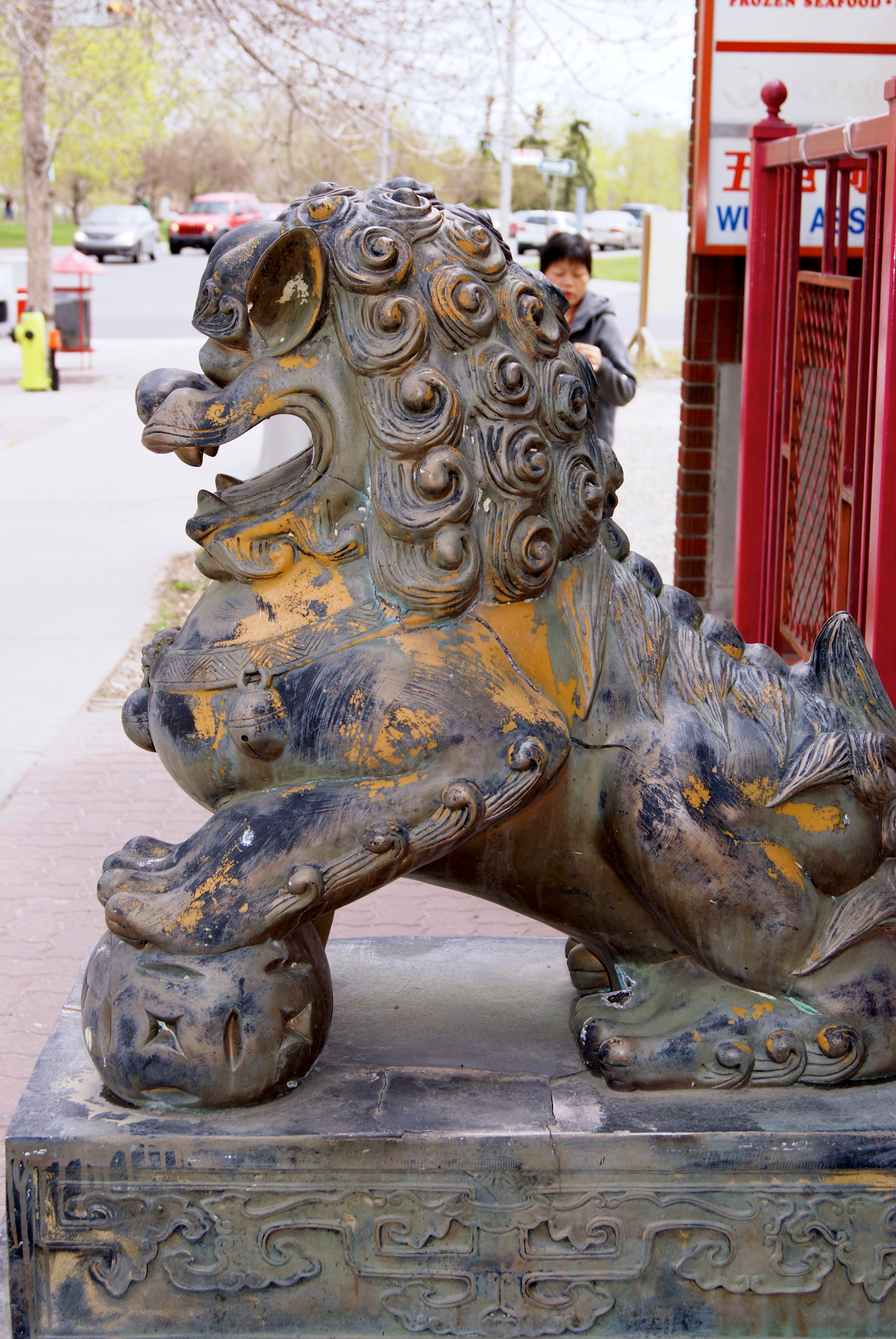 Protective male lion - There's lots of Feng Shui in Chinatown's art and edifice - photo credit - Karen Anderson