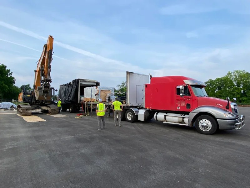 Construction equipment and crew supporting a trenchless CIPP stormwater pipe rehabilitation project.