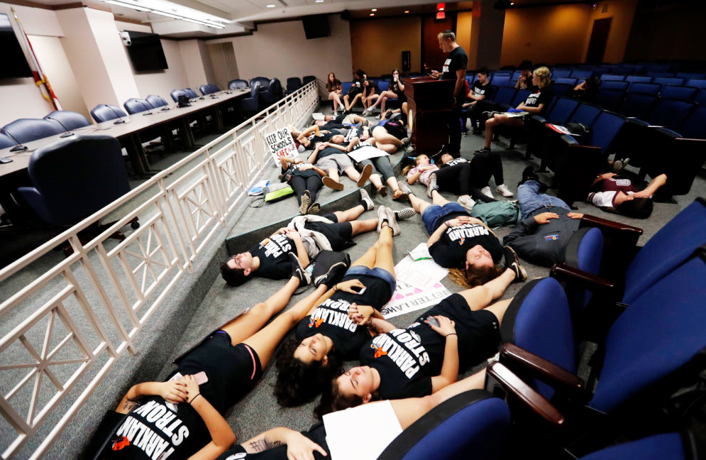 Student survivors mark the one-week anniversary of the Stoneman Douglas school shooting with a protest at the Florida state capitol in Tallahassee. (Gerald Herbert/AP)