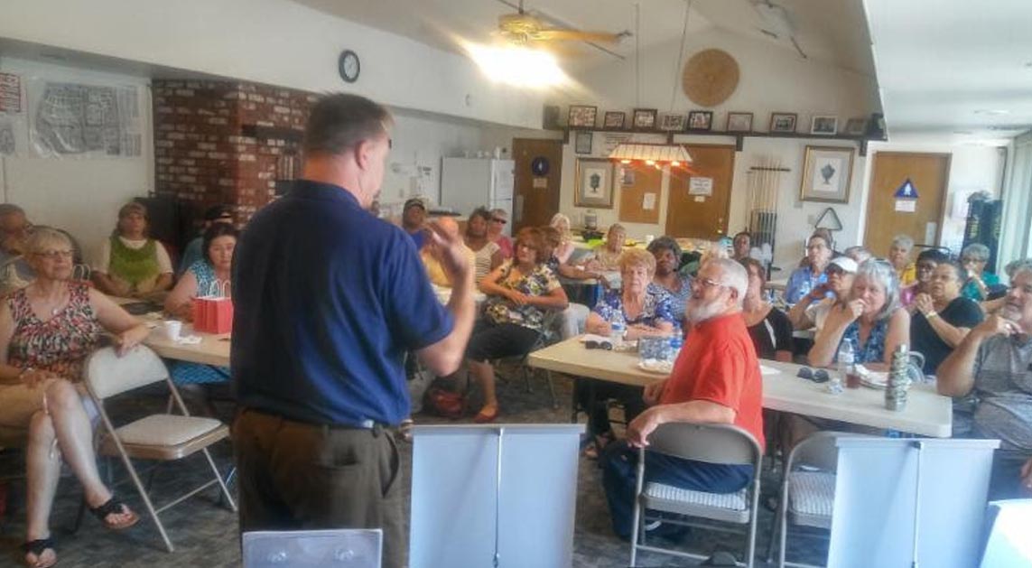 Clear Captions representative, Mitch Alpine demonstrated high tech telephone equipment and devices specialties for the hearing impaired.