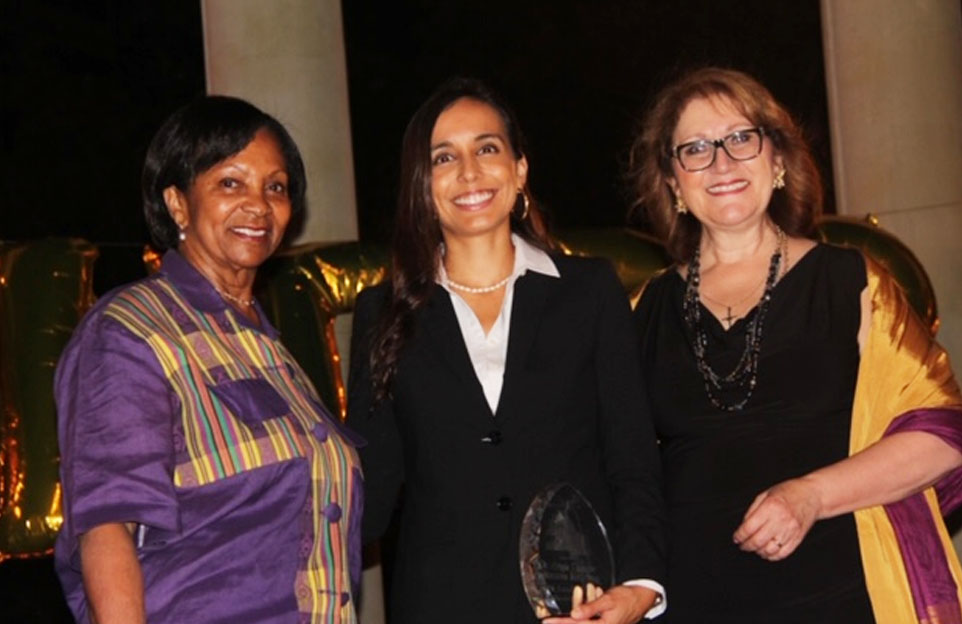 In coordination with Assembly Member Reyes, The Honorable Wilmer 'Amina' Carter presented the Award for '30 Under 30' Continuing Service. to Dr Verissiano.