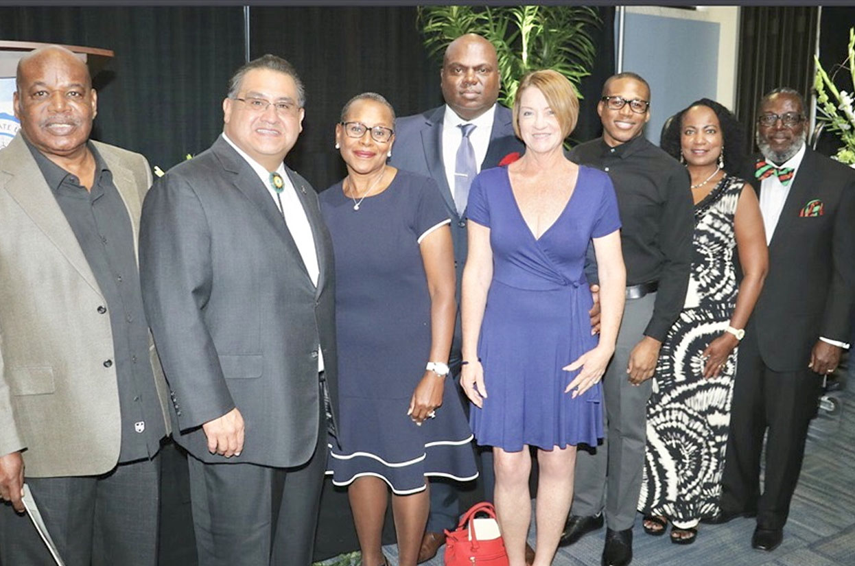 Terry Futch, Assemblymember James Ramos, Lois Ford, Marcus Futch, Mary Futch, Aaron Gleen, Sheila Umbaji Futch and Stan Amiri Futch