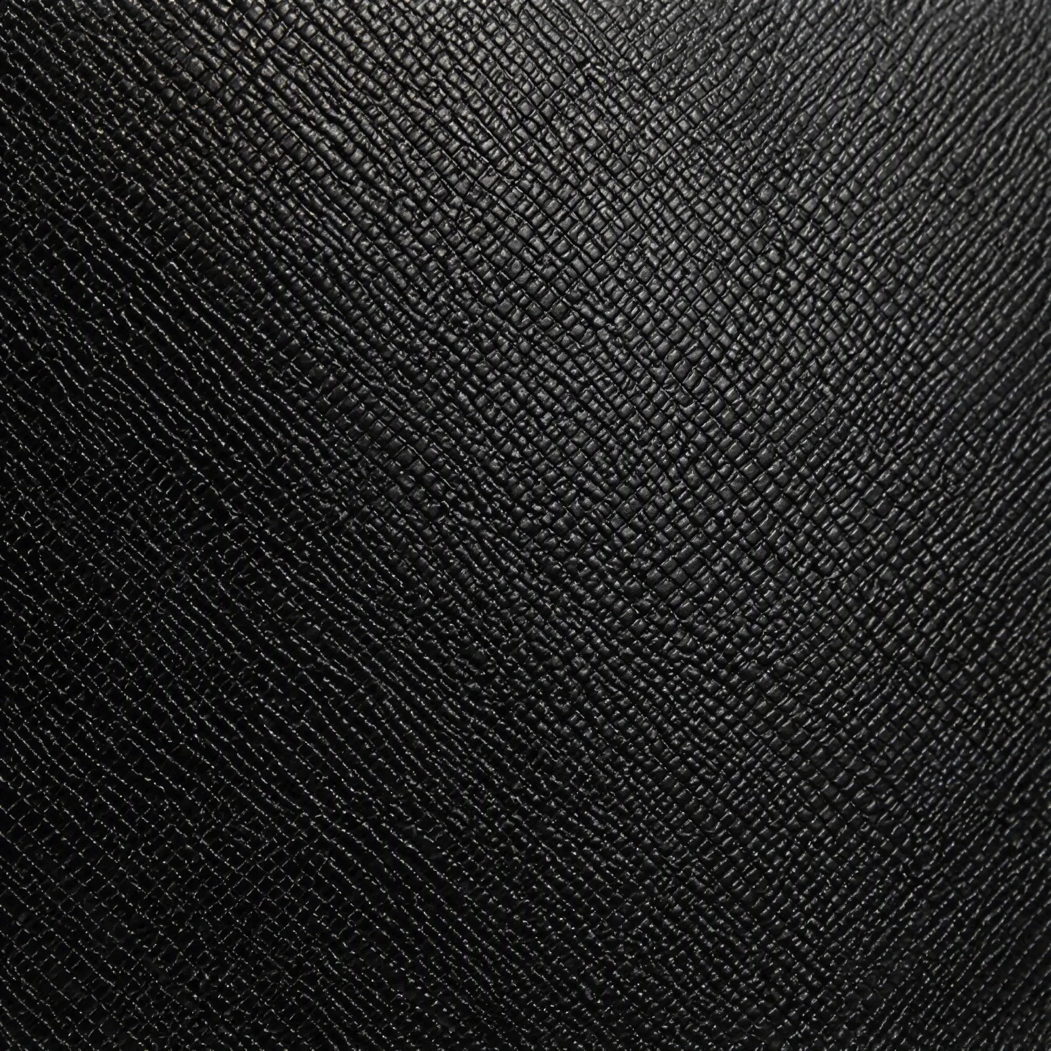 black crosshatch textured pvc surface texture close up