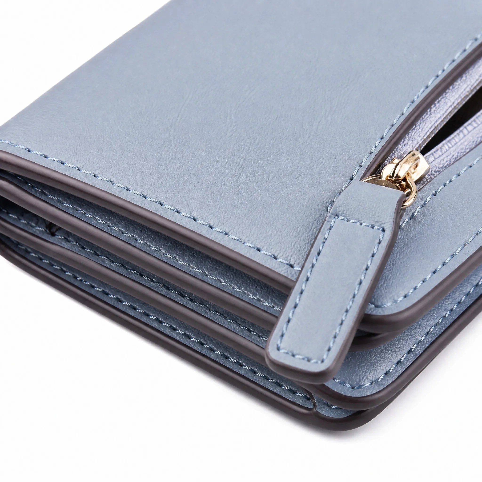 Powder blue matte leather surface texture with edge paint stitching