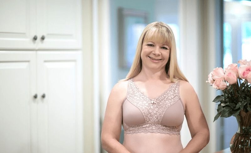 Constructed with a princess seam for a flattering fit. High neckline provides added coverage & high side panels give extra underarm support. Beautiful lace design can double as a camisole. Shallow to average fit.