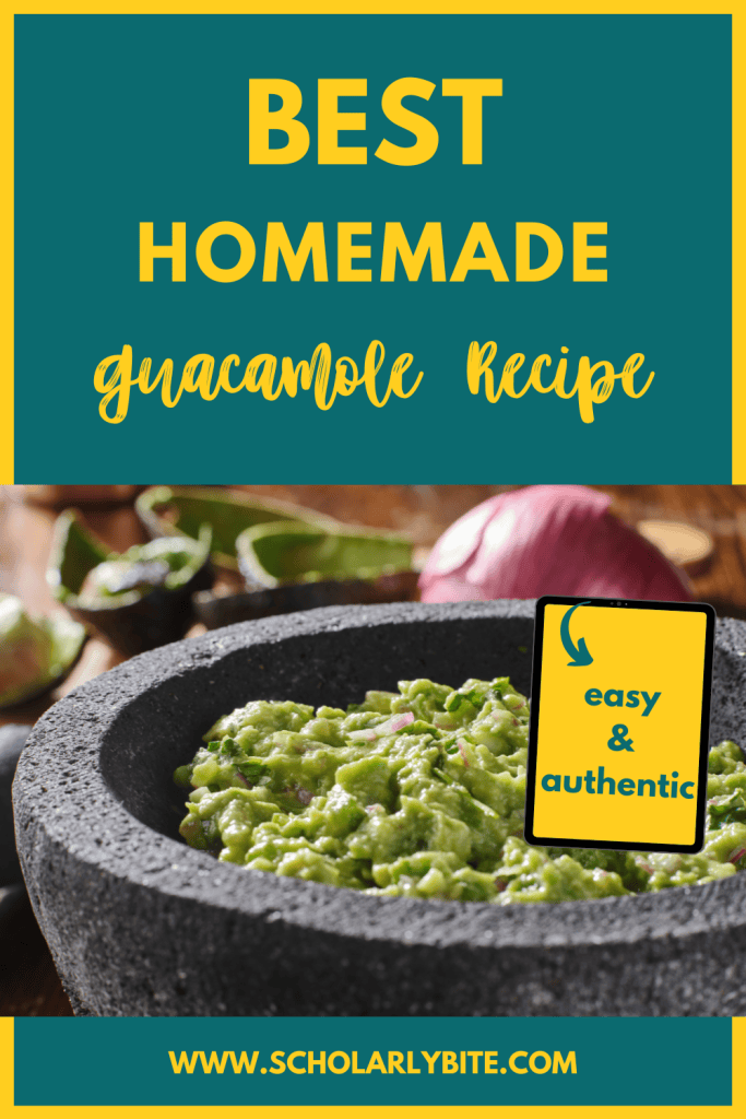 Guacamole in a dark grey stone bowl with whole red onion and empty avocado shells with seed in background