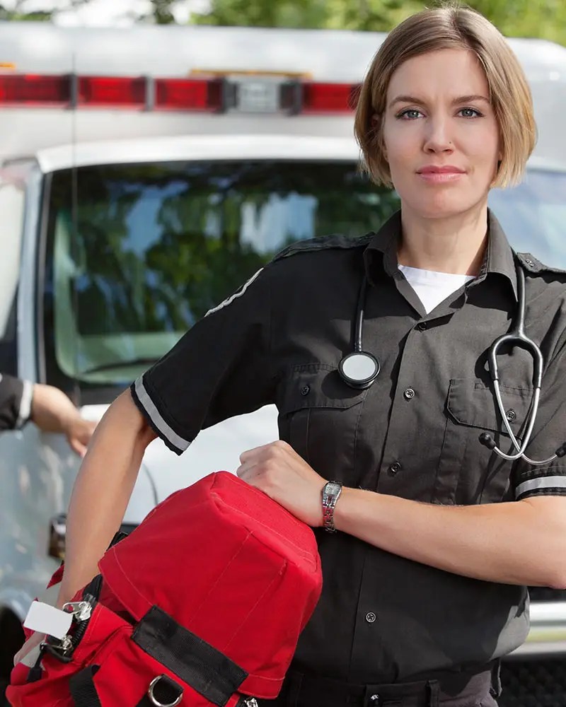 EMT paramedic responding to an emergency, representing California county EMS authority training programs
