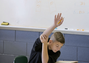 student raising hand