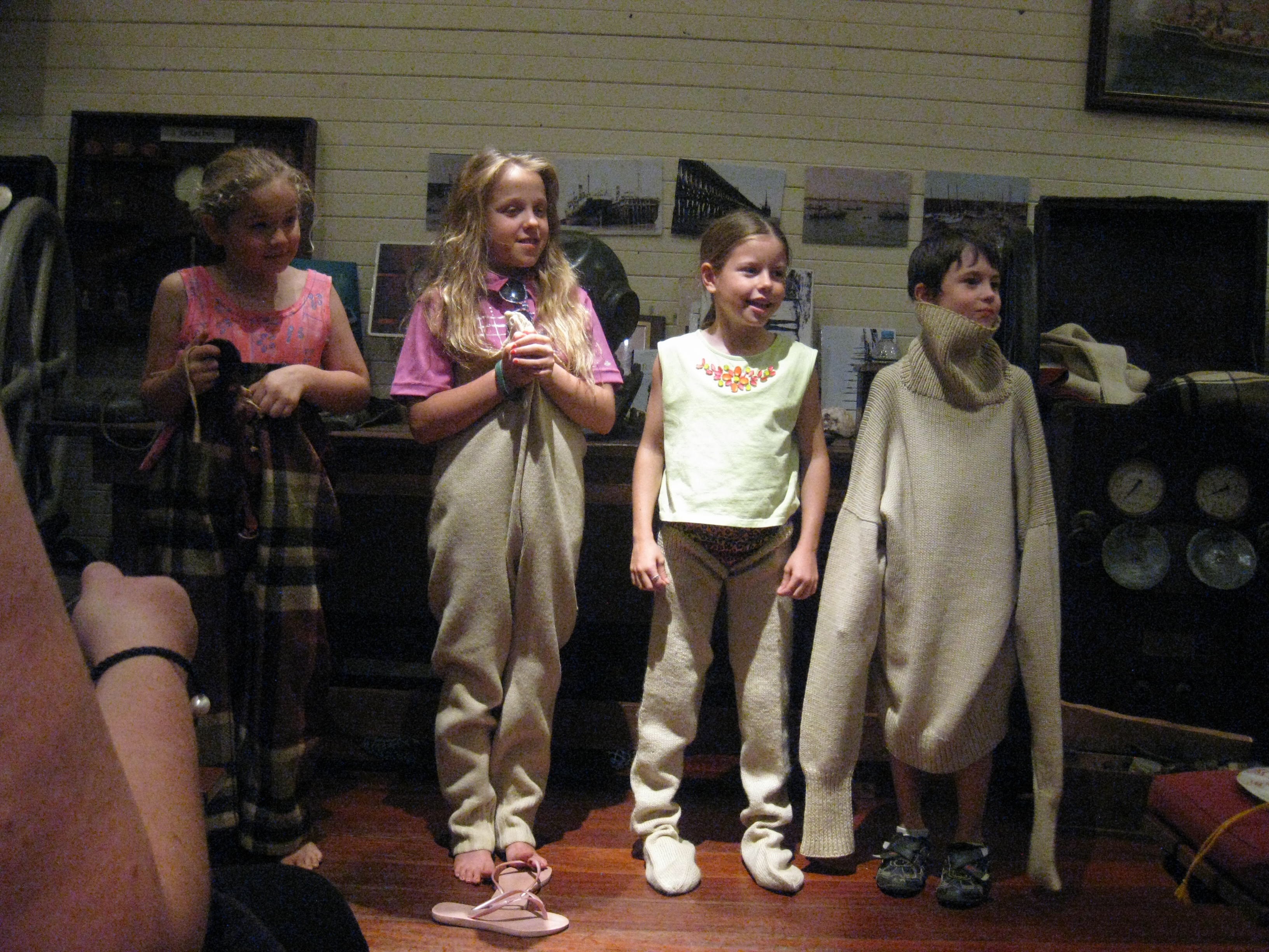 Some very cute kids demonstrating the under garments a pearl diver wore