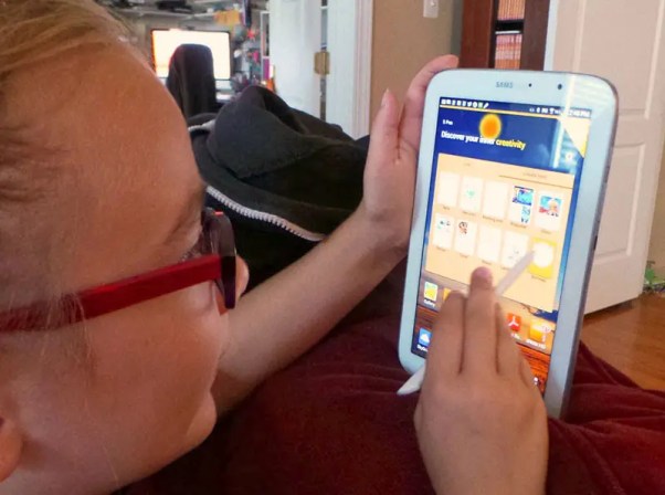 My daughter using a tablet.