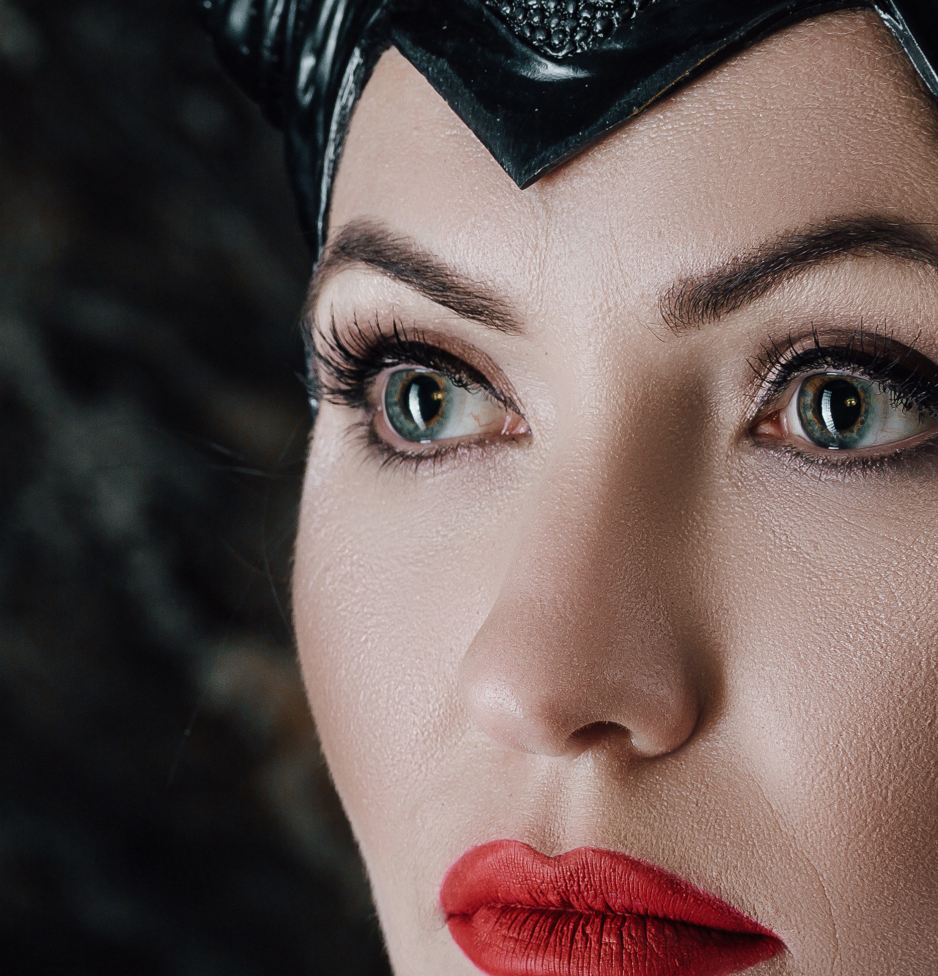 beautiful woman dressed as Maleficent By producer