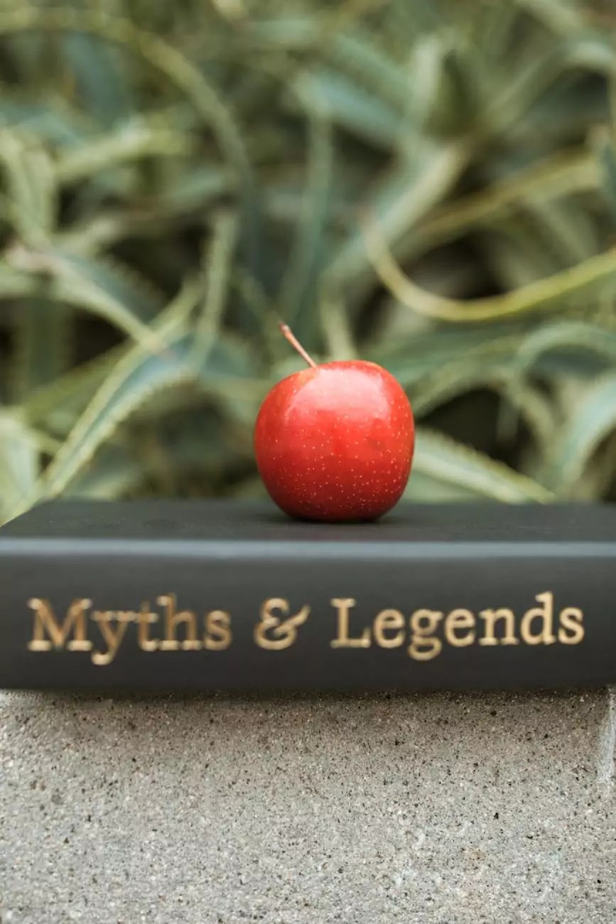 red apple on top of a book
