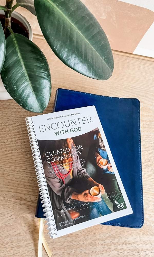 Encounter With God Bible Reading Guide on a Bible