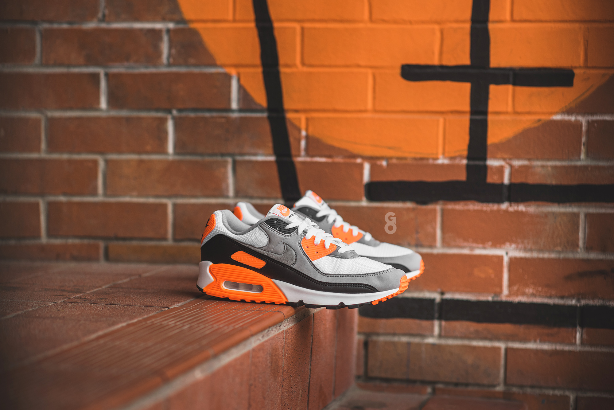 air max 90 total orange on feet