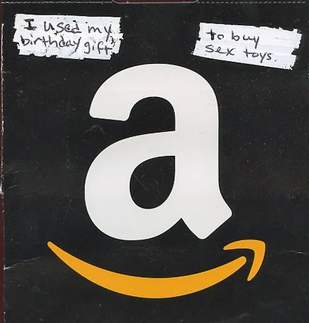 The front features a prominent Amazon logo with handwritten text.