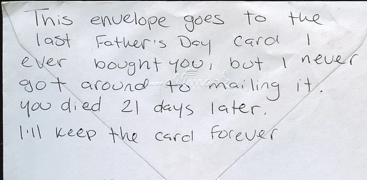 Handwritten note on an envelope expressing deep emotions about loss.