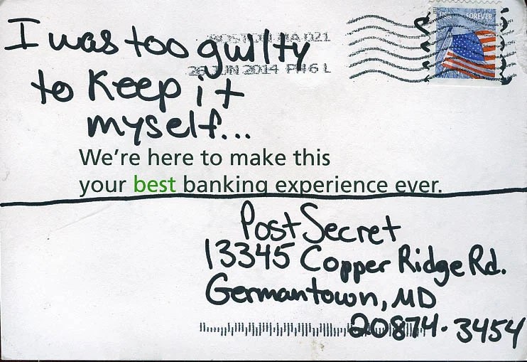A handwritten message on a postcard with a banking advertisement.