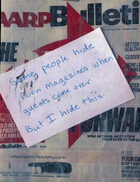 A note on a magazine background, with handwritten text.