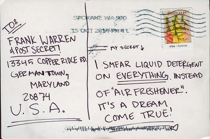 A handwritten postcard with a playful secret about using liquid detergent.